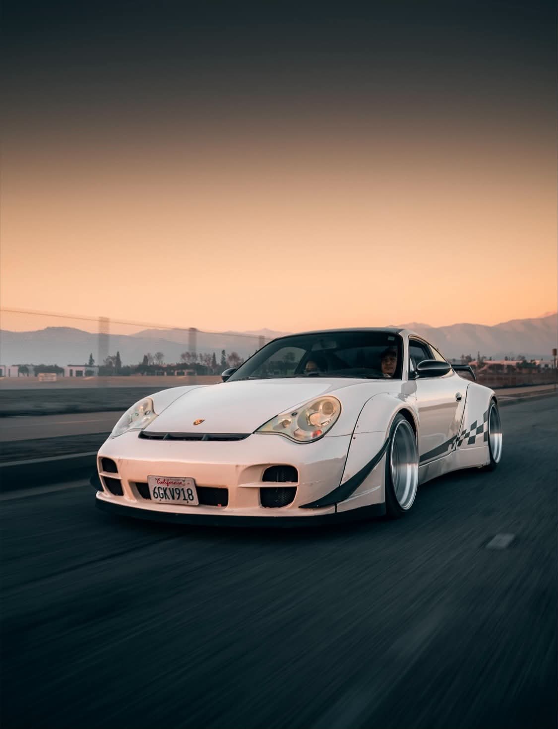 BRS Aero Design widebody Porsche on track at sunset