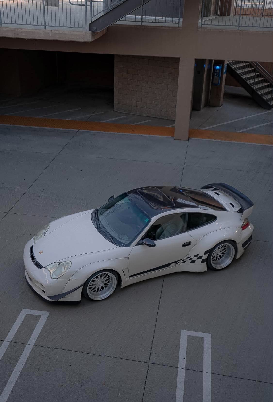 BRS Aero Design widebody Porsche 996, front three-quarter from above, dusk